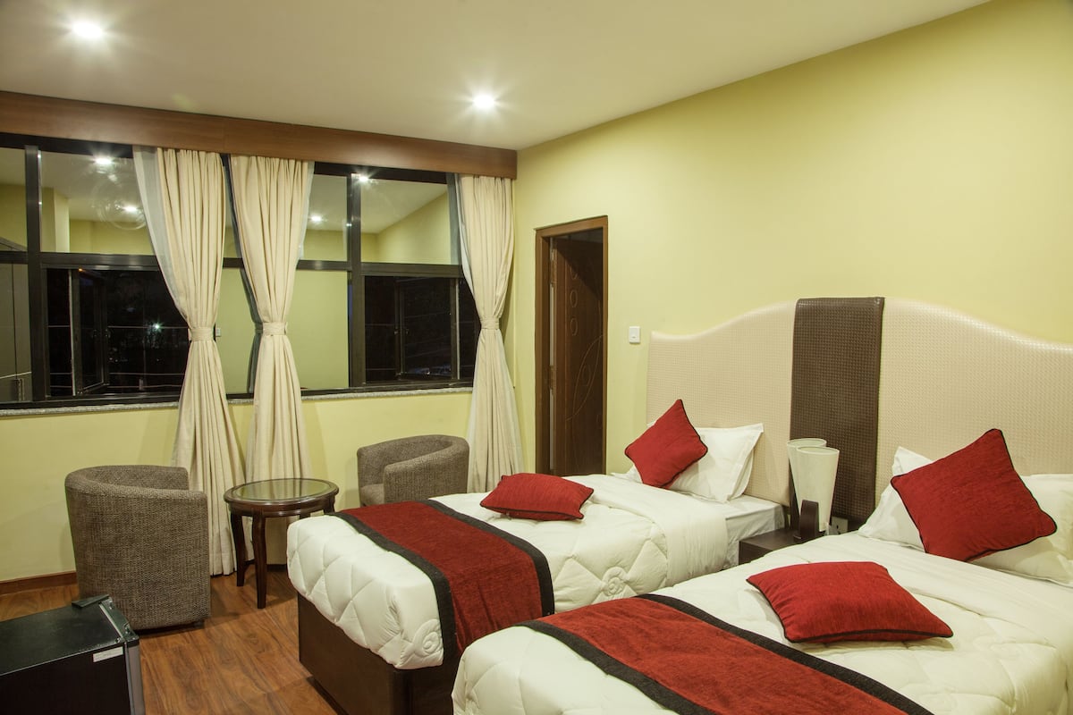 Chambre avec lits jumeaux, 2 lits une place, salle de bains privée