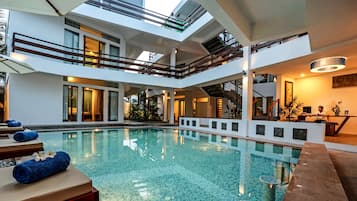 Outdoor pool, pool umbrellas, pool loungers