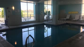 Indoor pool, pool umbrellas, pool loungers