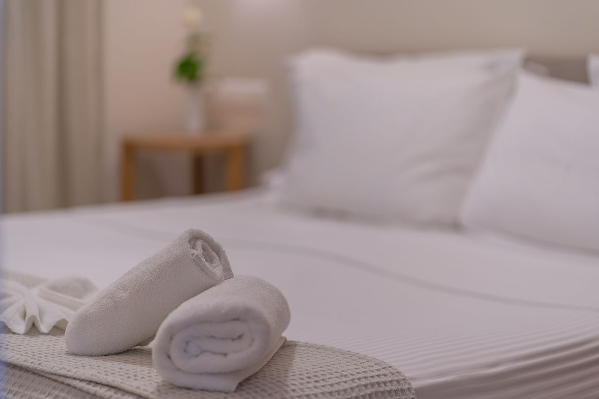 Junior Suite, Pool View | In-room safe, desk, soundproofing, iron/ironing board