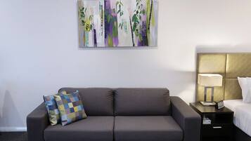 Premium bedding, pillow-top beds, minibar, in-room safe