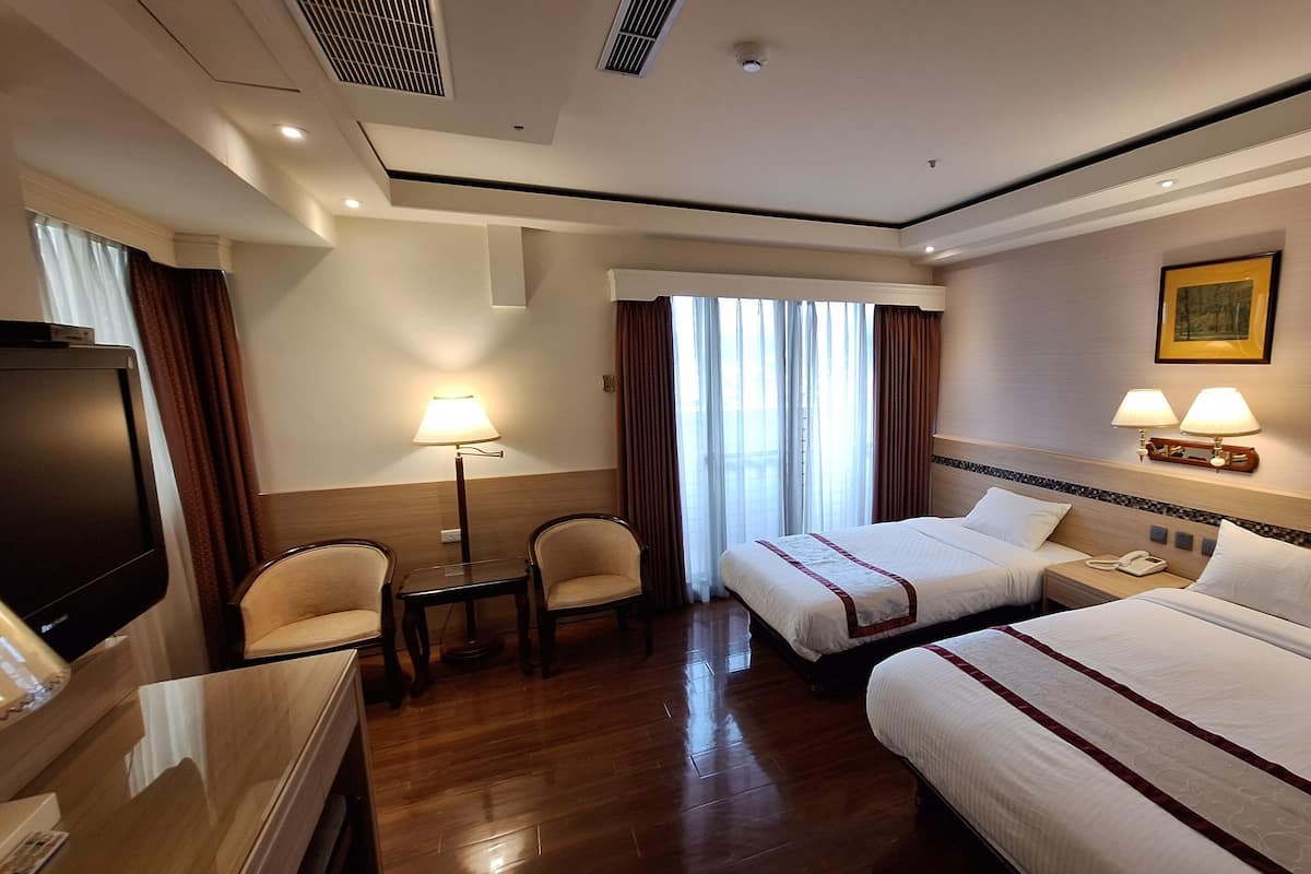 Triple Room | 1 bedroom, in-room safe, desk, blackout drapes
