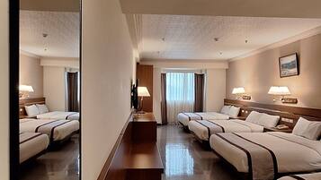 Standard Room, Multiple Beds | 1 bedroom, in-room safe, desk, laptop workspace