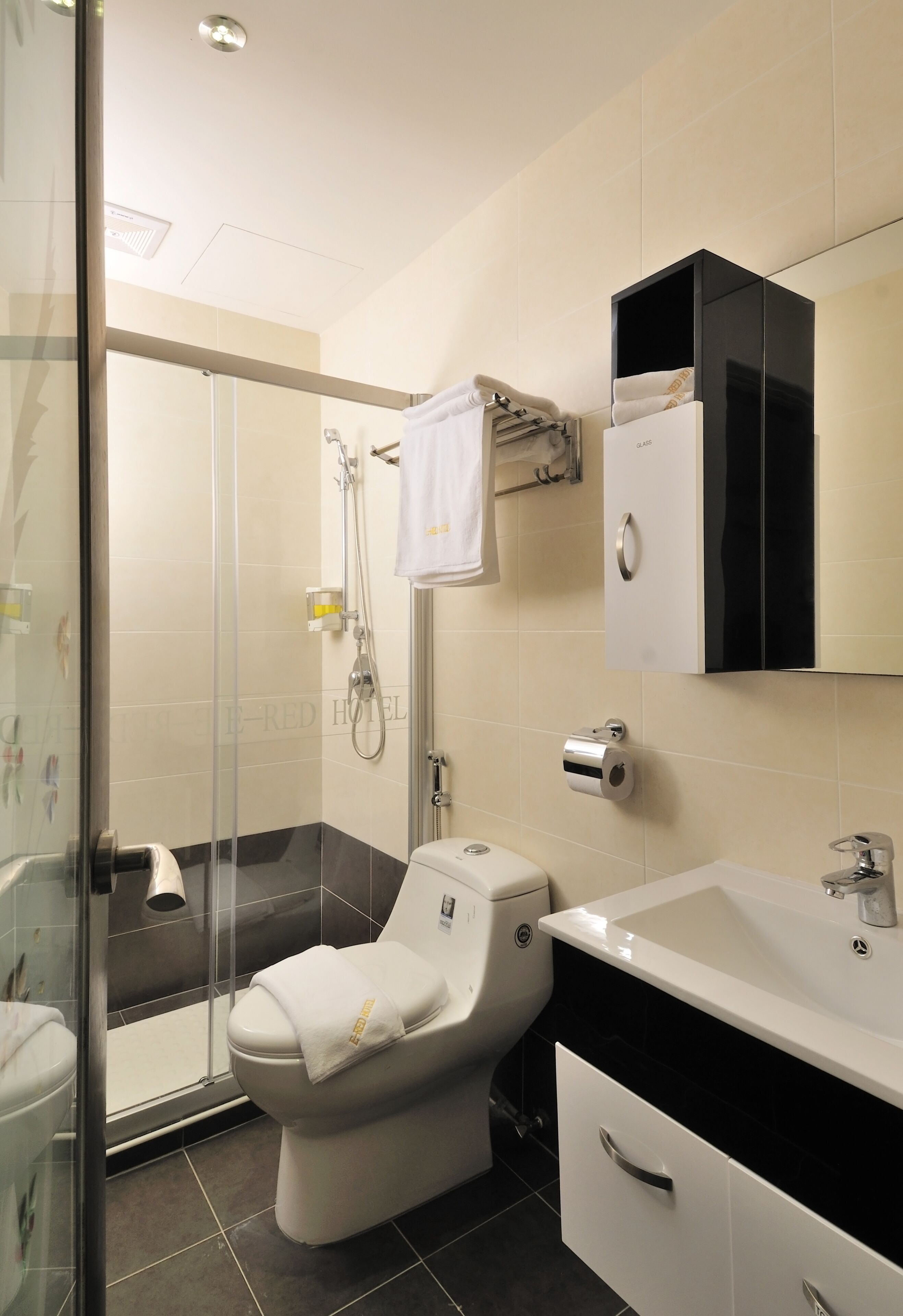Shower, free toiletries, hair dryer, slippers