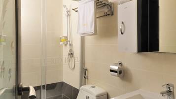 Shower, free toiletries, hair dryer, slippers