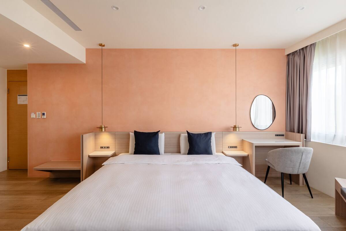 Deluxe Suite | Premium bedding, desk, blackout drapes, soundproofing