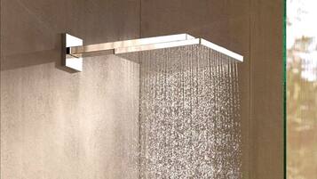 A modern shower with a horizontal design and a visible water flow.