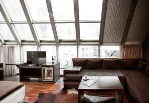 40-inch flat-screen TV with satellite channels, TV