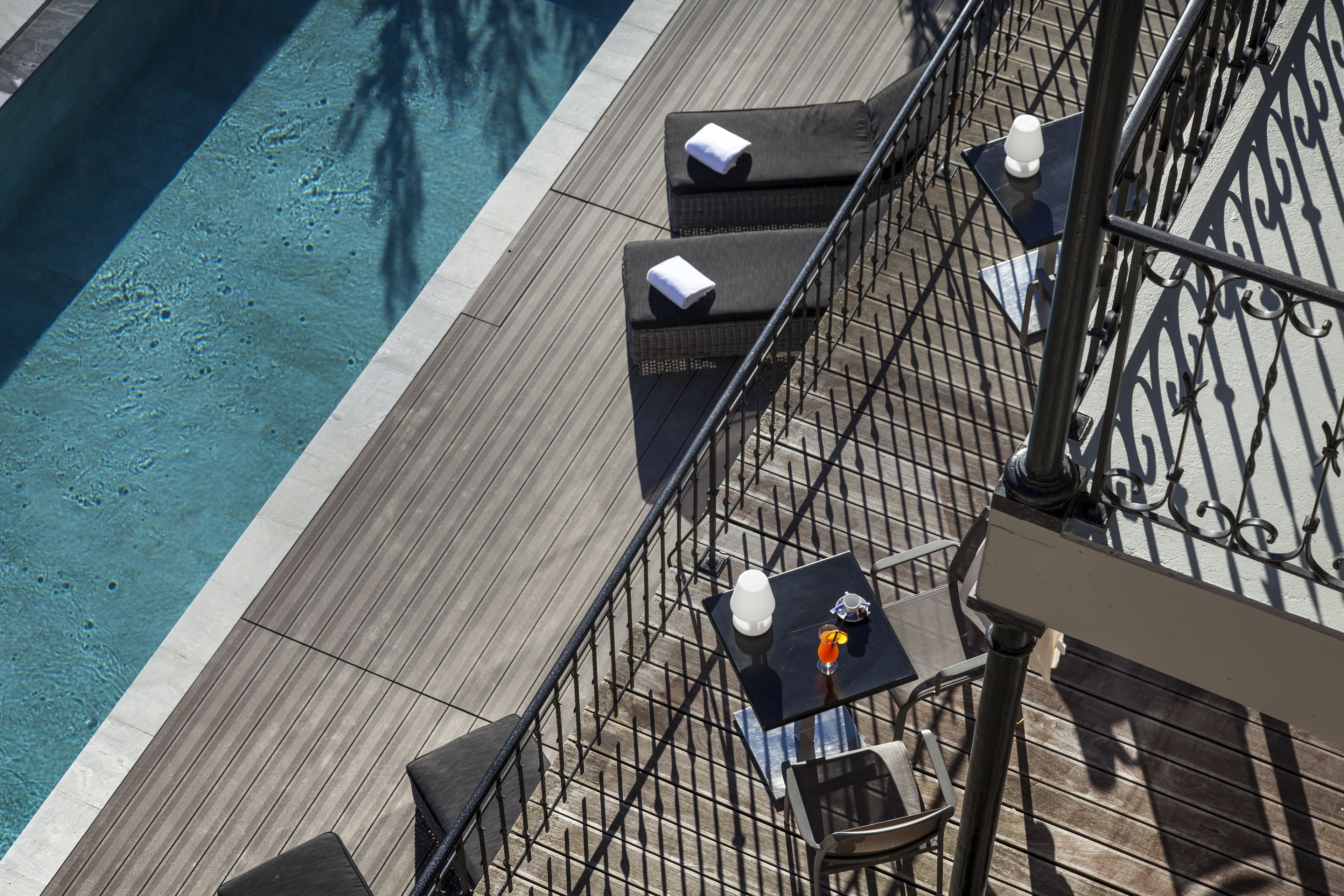 outdoor pool, pool umbrellas, pool loungers