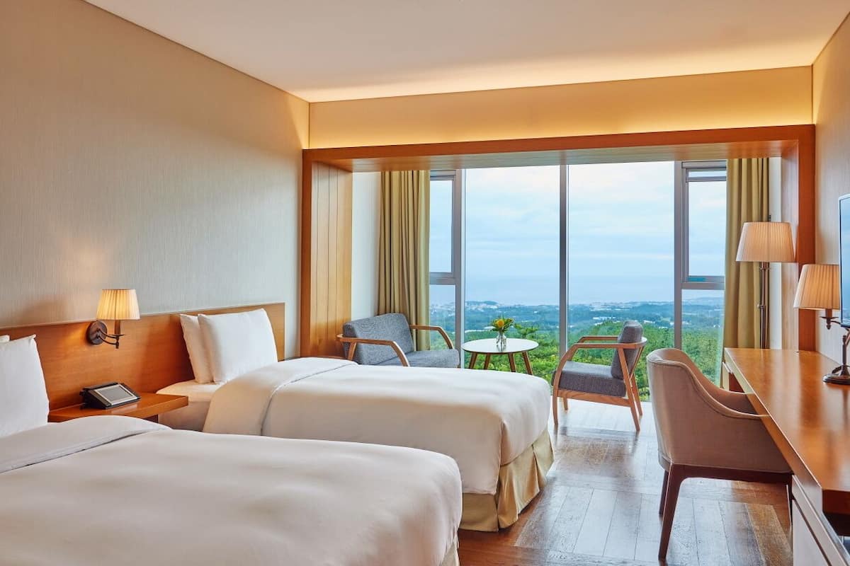 Superior Twin (Double+Single/Sea View) | 1 bedroom, down duvets, in-room safe, individually furnished