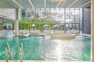 Indoor pool, seasonal outdoor pool, pool umbrellas, sun loungers