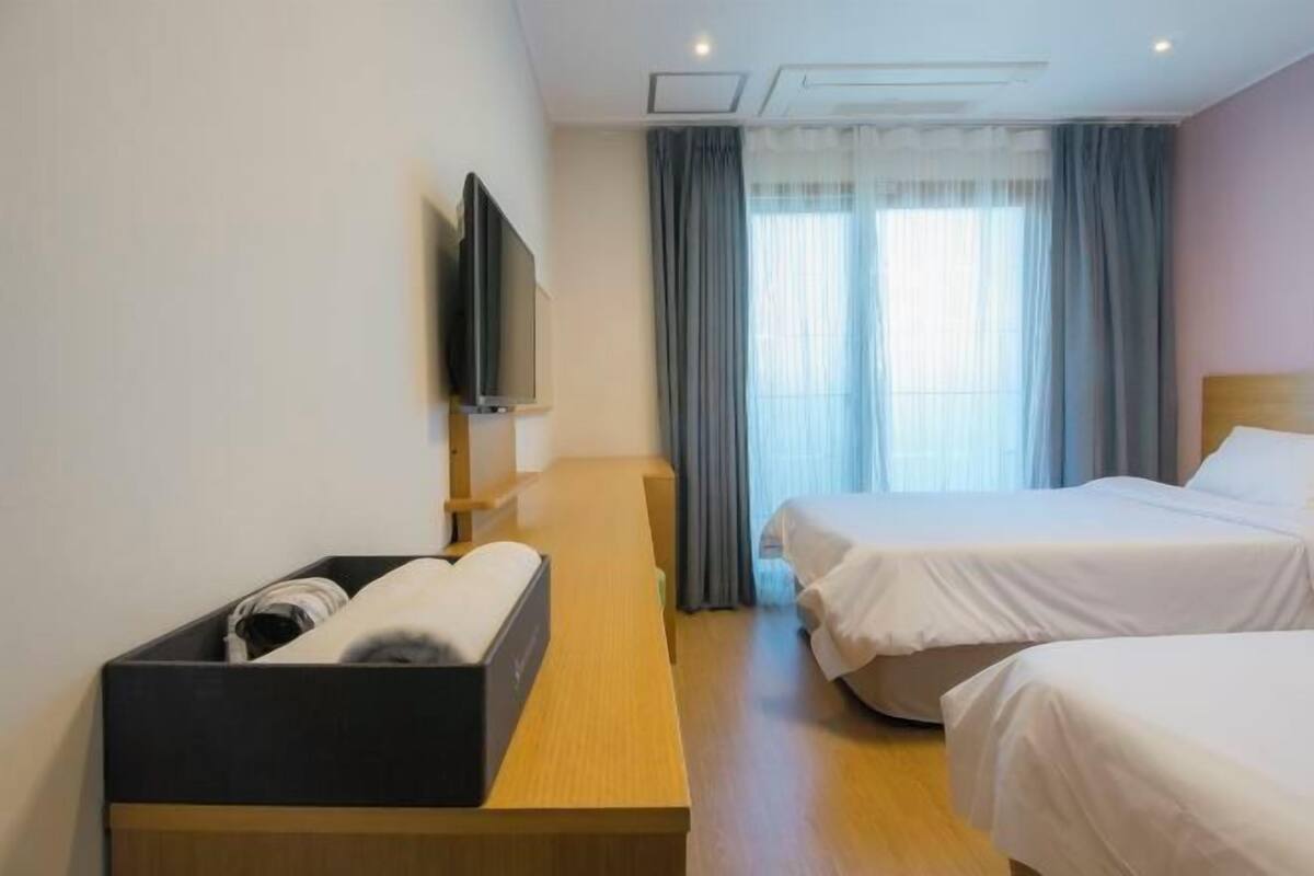 Blackout drapes, soundproofing, WiFi (free), bed sheets