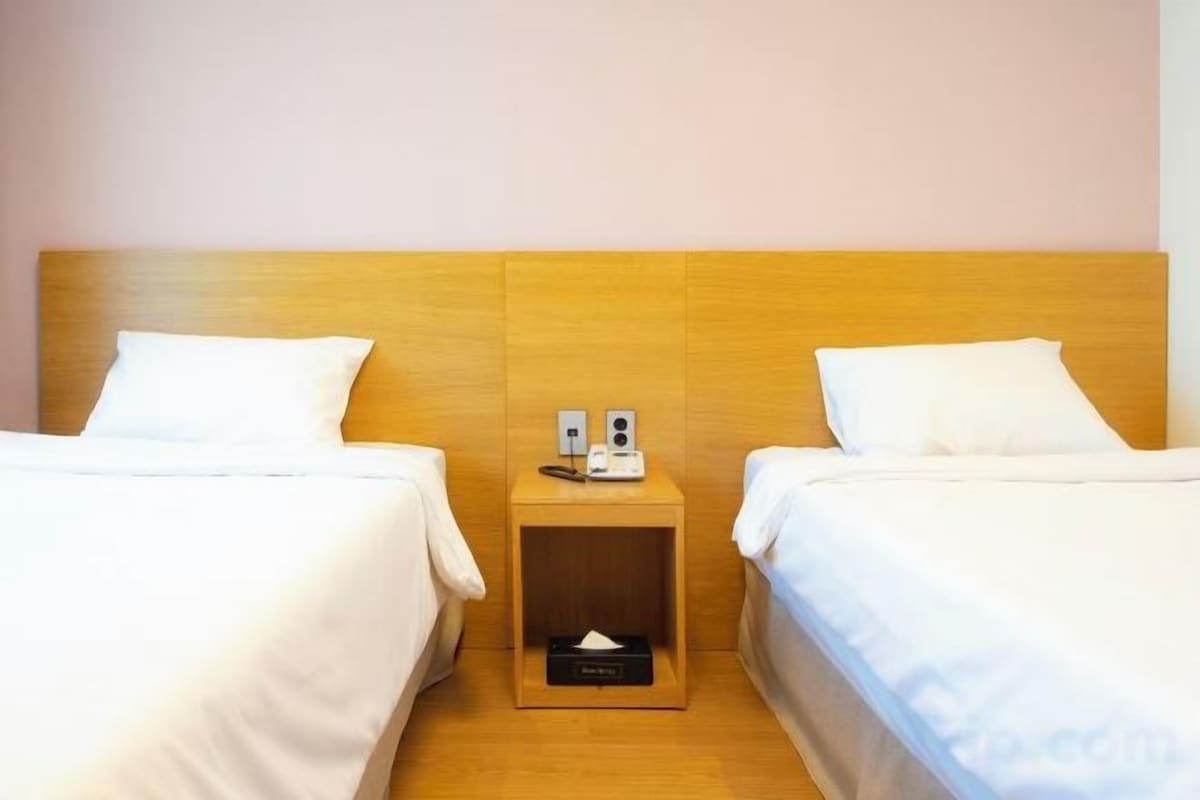 Blackout drapes, soundproofing, WiFi (free), bed sheets
