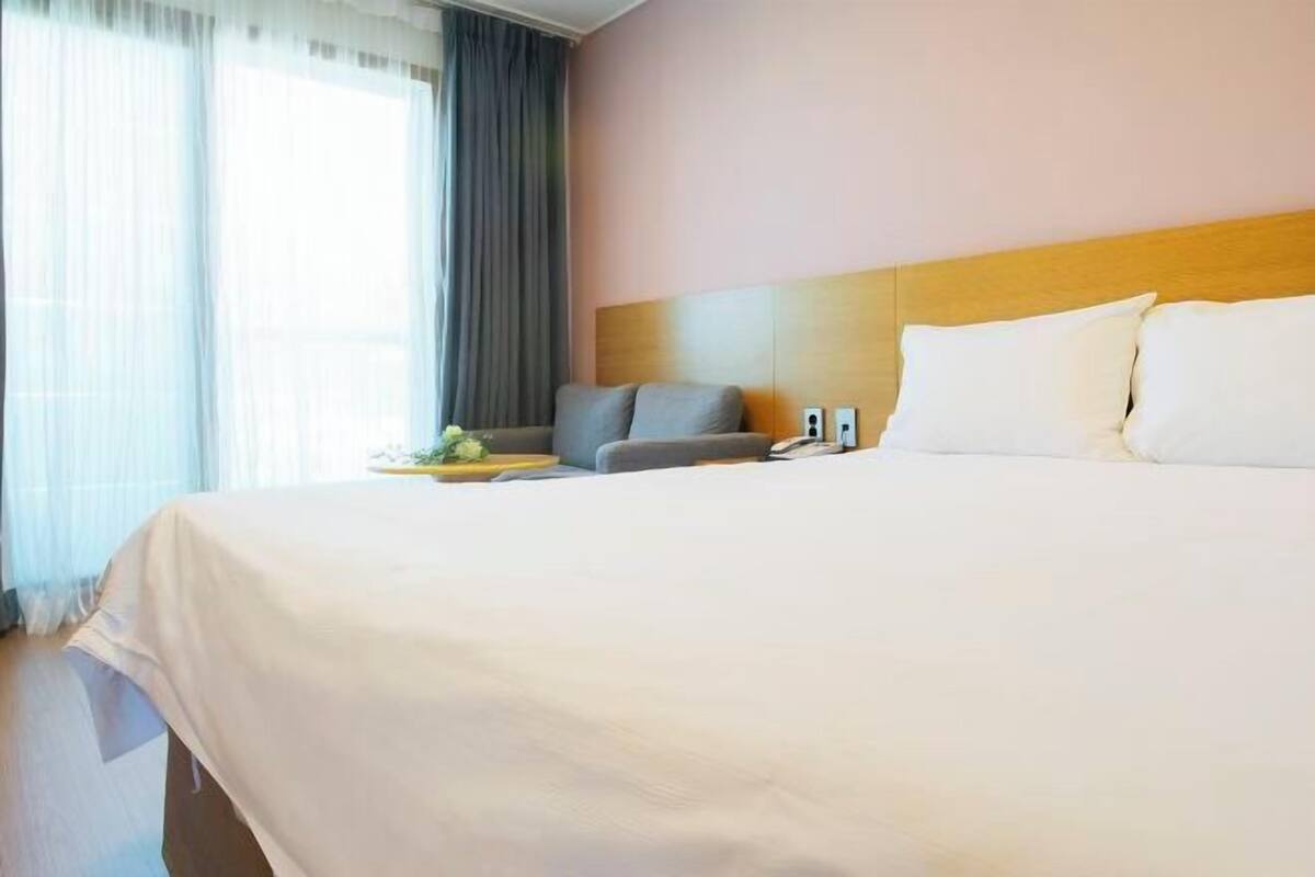 Blackout drapes, soundproofing, WiFi (free), bed sheets
