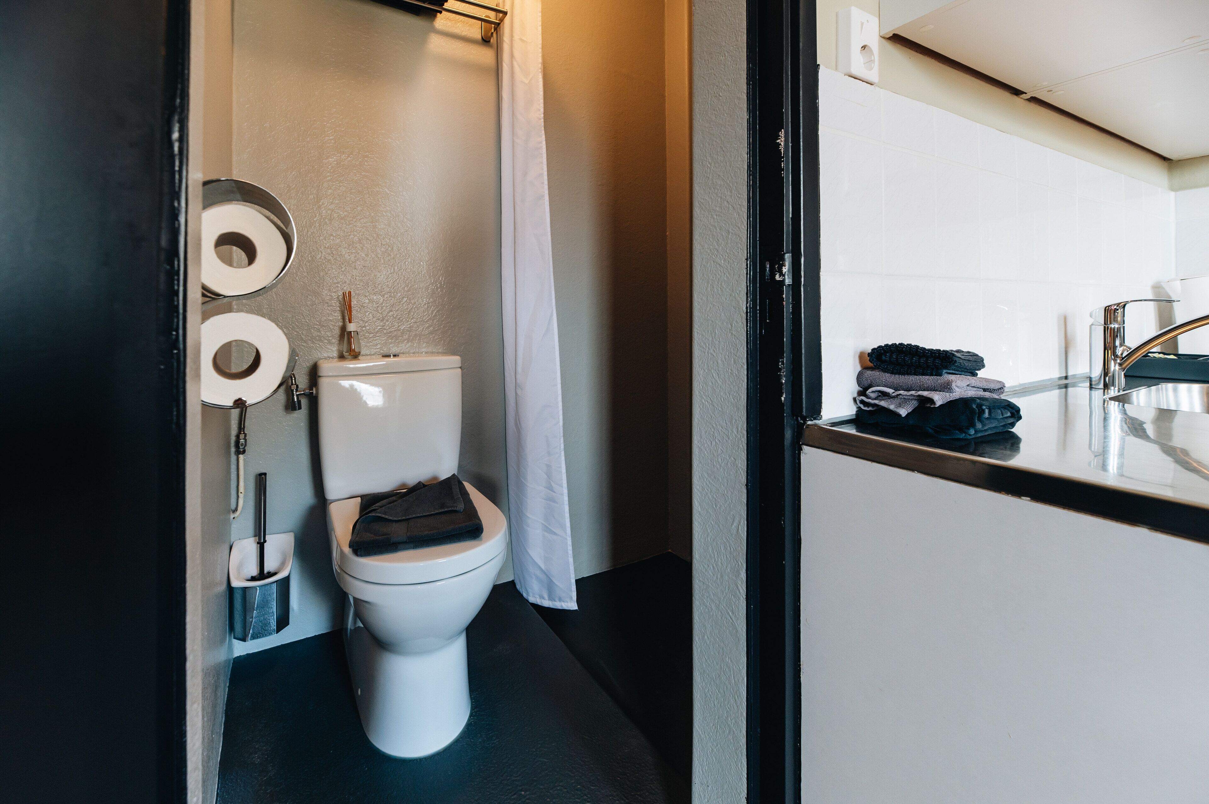 standard studio | bathroom | shower, hair dryer, towels, soap