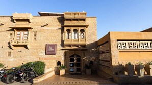 A traditional building with a sign reading "1st Gate." - 1st Gate Home - Fusion (Jaisalmer)
