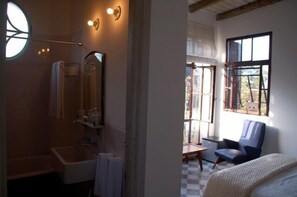 Standard Room, Courtyard Area | Bathroom | Combined shower/tub, free toiletries, hair dryer, bathrobes