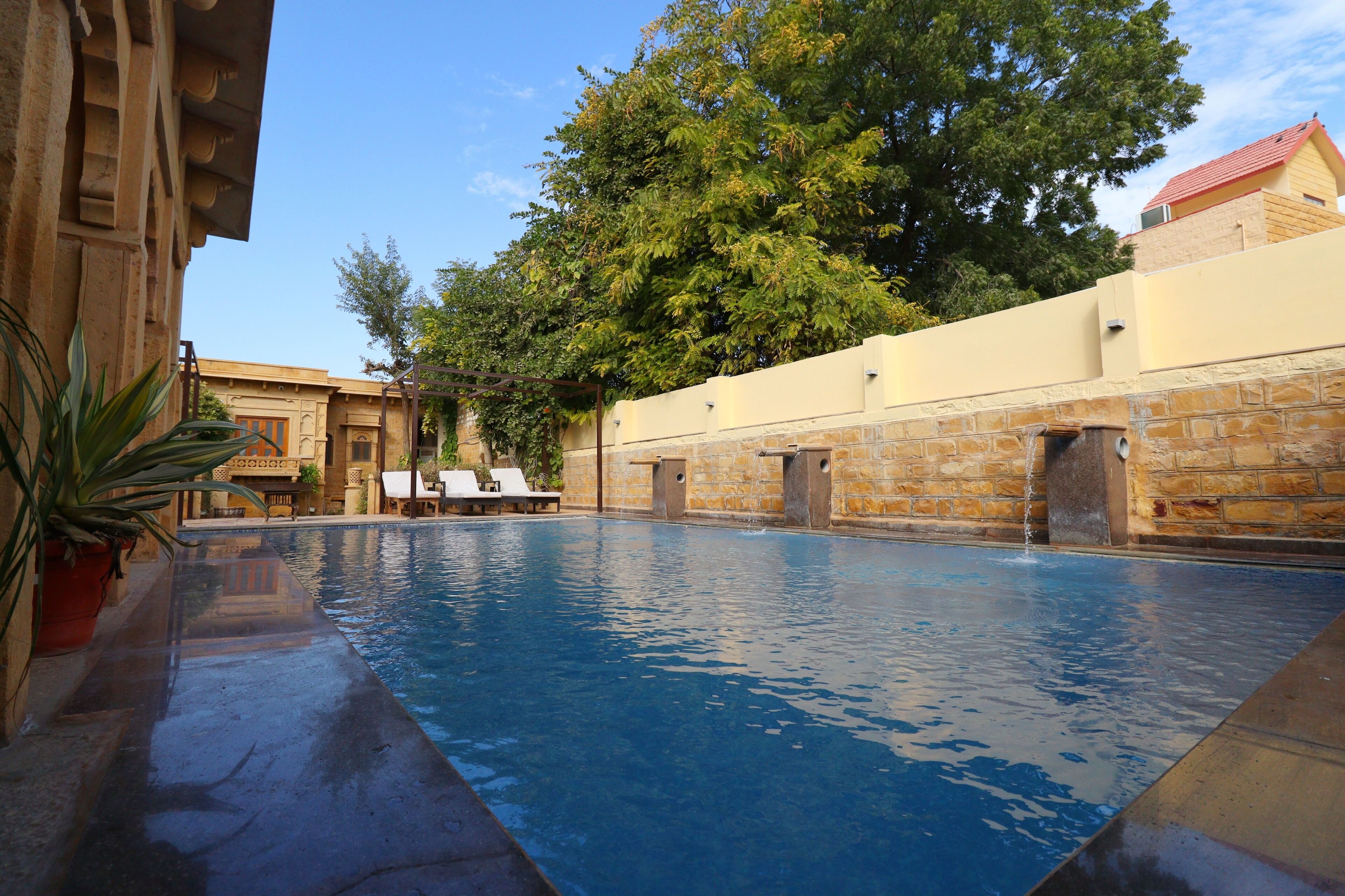 outdoor pool, pool loungers