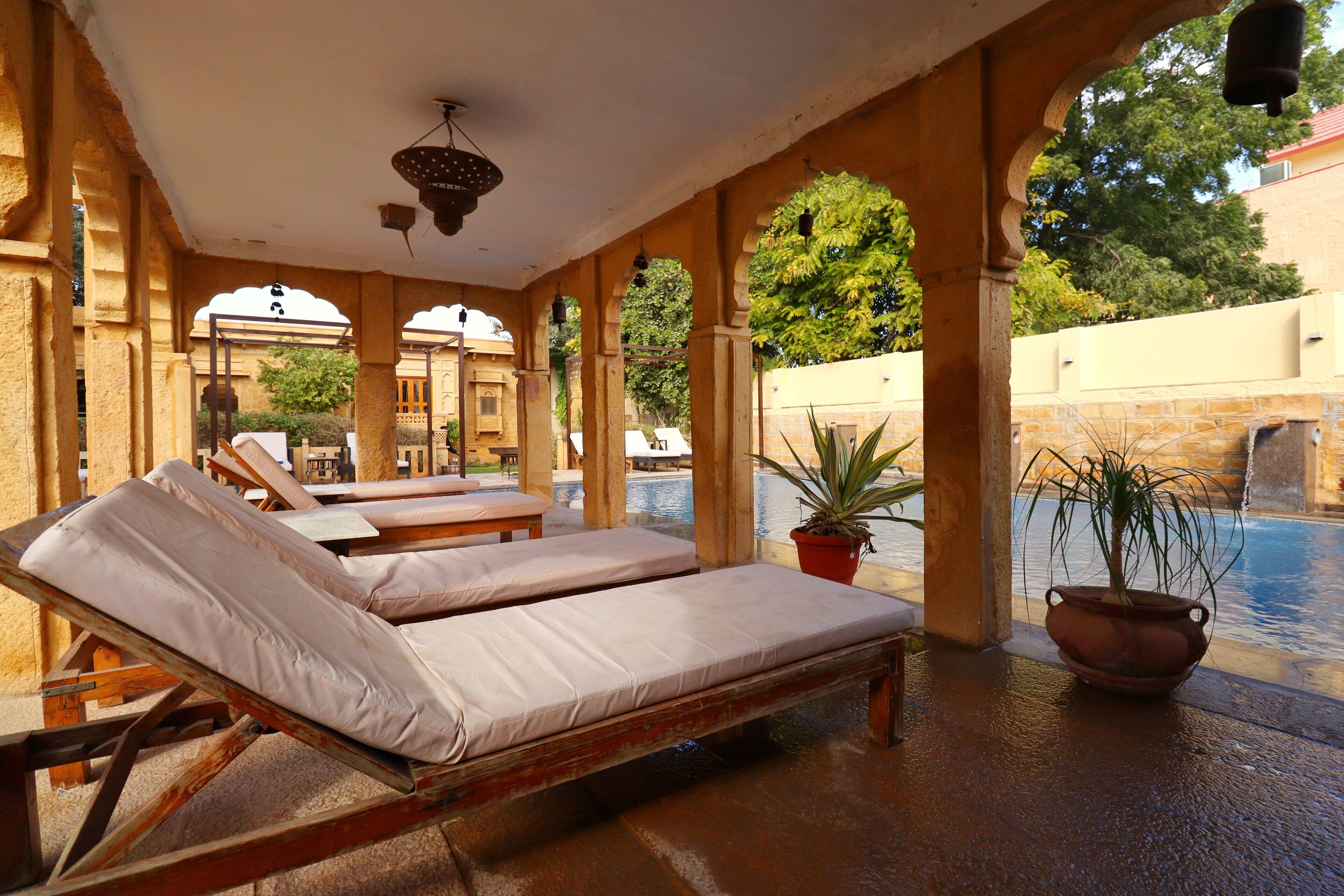 outdoor pool, pool loungers