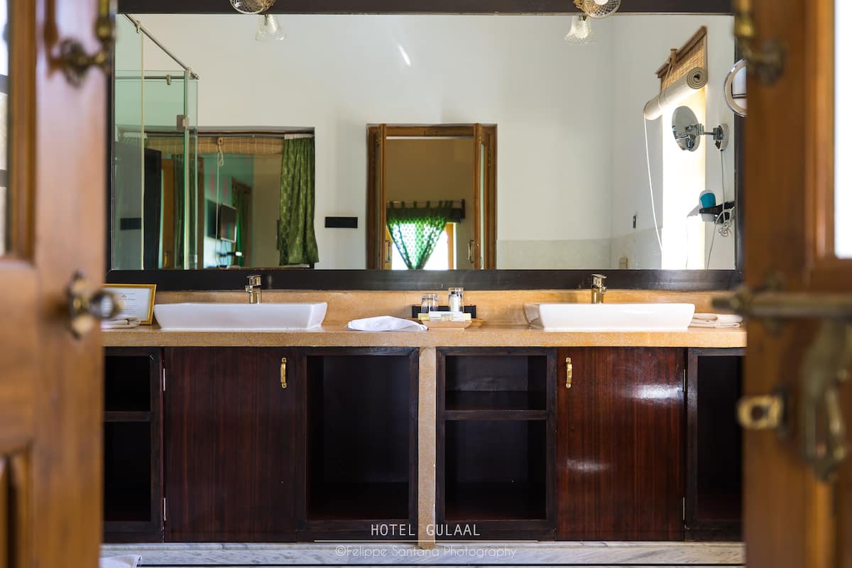 luxury suite, 1 bedroom | bathroom | shower, free toiletries, hair dryer, dressing gowns