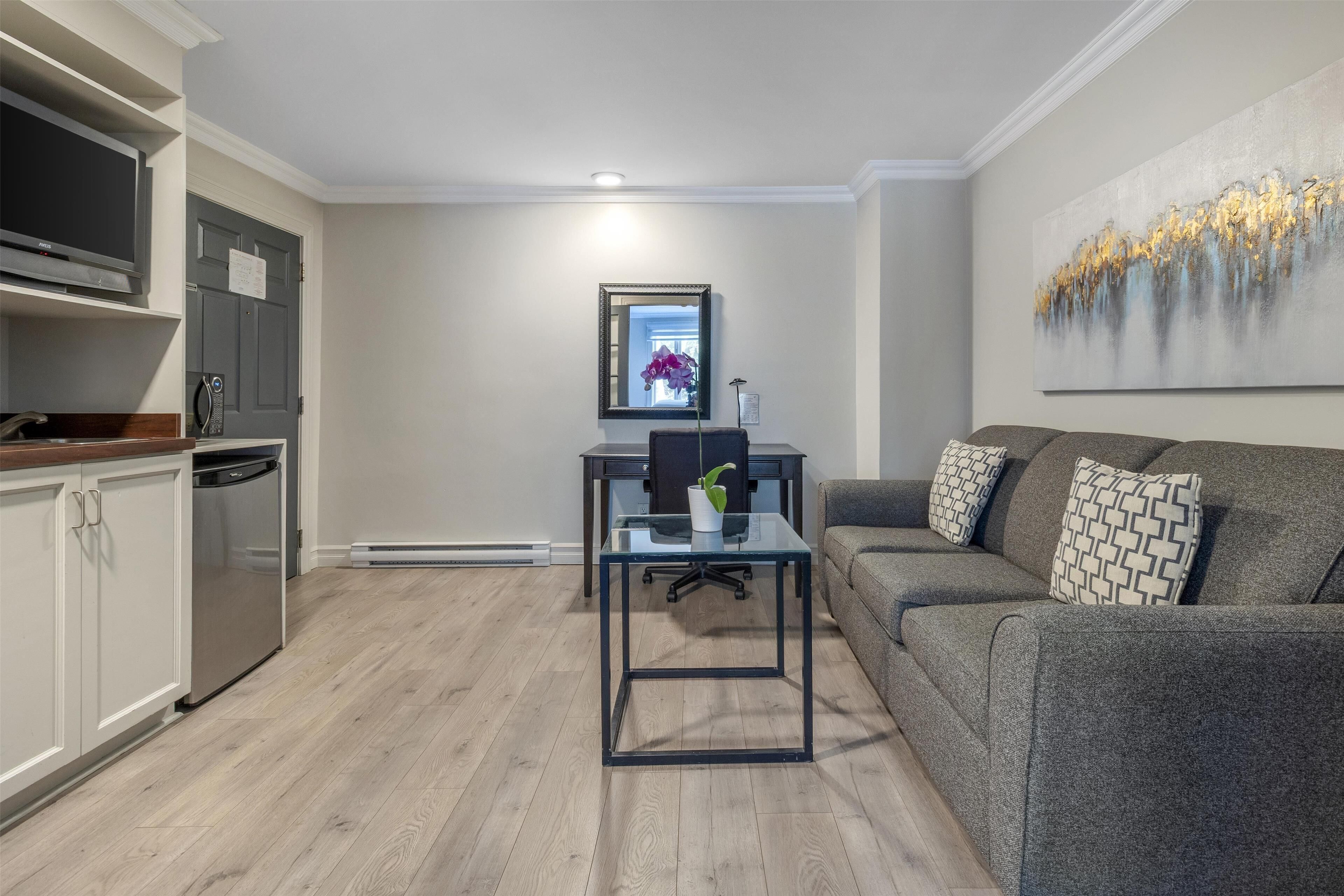 suite, 1 king bed with sofa bed, accessible, non smoking (with sofabed) | 1 bedroom, laptop workspace, iron/ironing board, rollaway beds