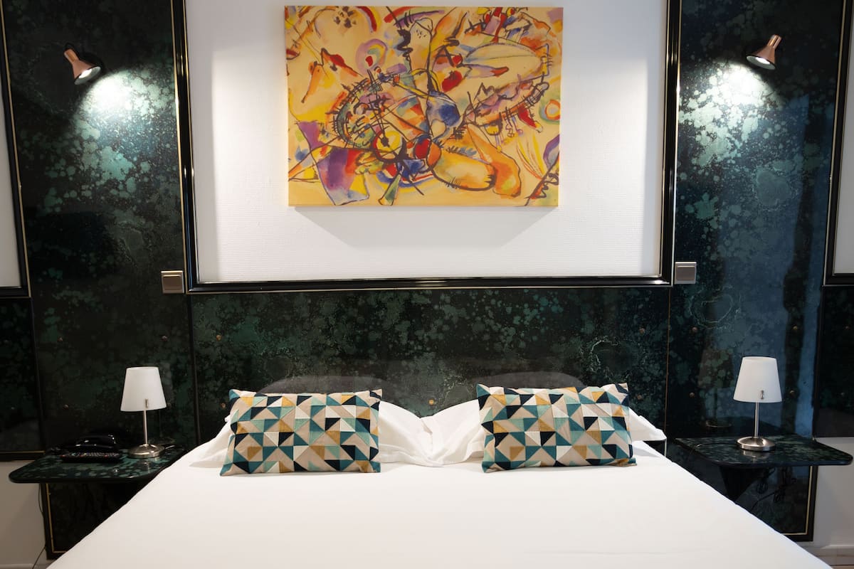 junior suite, 1 queen bed, private bathroom | premium bedding, desk, soundproofing, iron/ironing board