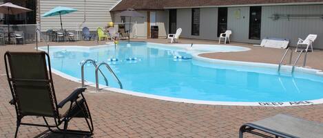 Outdoor pool, open 9:30 AM to 9:30 PM, pool umbrellas, sun loungers