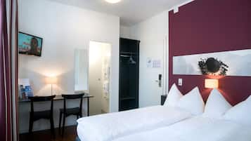 Economy Single Room | Hypo-allergenic bedding, down comforters, laptop workspace