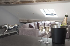 One Bedroom Super-Luxe (Sleeps 5) | Living area | 52-inch Smart TV with digital channels