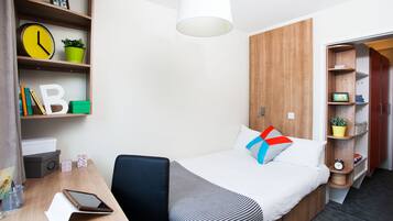 Desk, laptop workspace, free WiFi, bed sheets