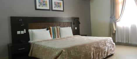Standard Room | 1 bedroom, in-room safe, individually decorated, individually furnished