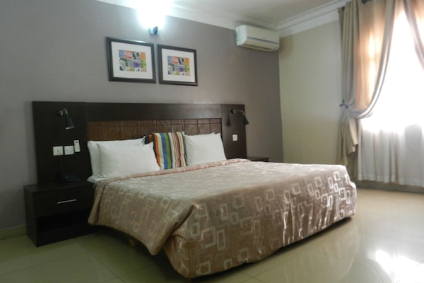 Standard Room | 1 bedroom, in-room safe, individually decorated, individually furnished