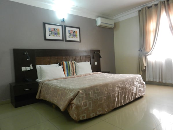 Standard Room | 1 bedroom, in-room safe, individually decorated, individually furnished - The Grill House (Abuja)