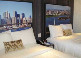 Premium bedding, pillowtop beds, in-room safe, individually decorated