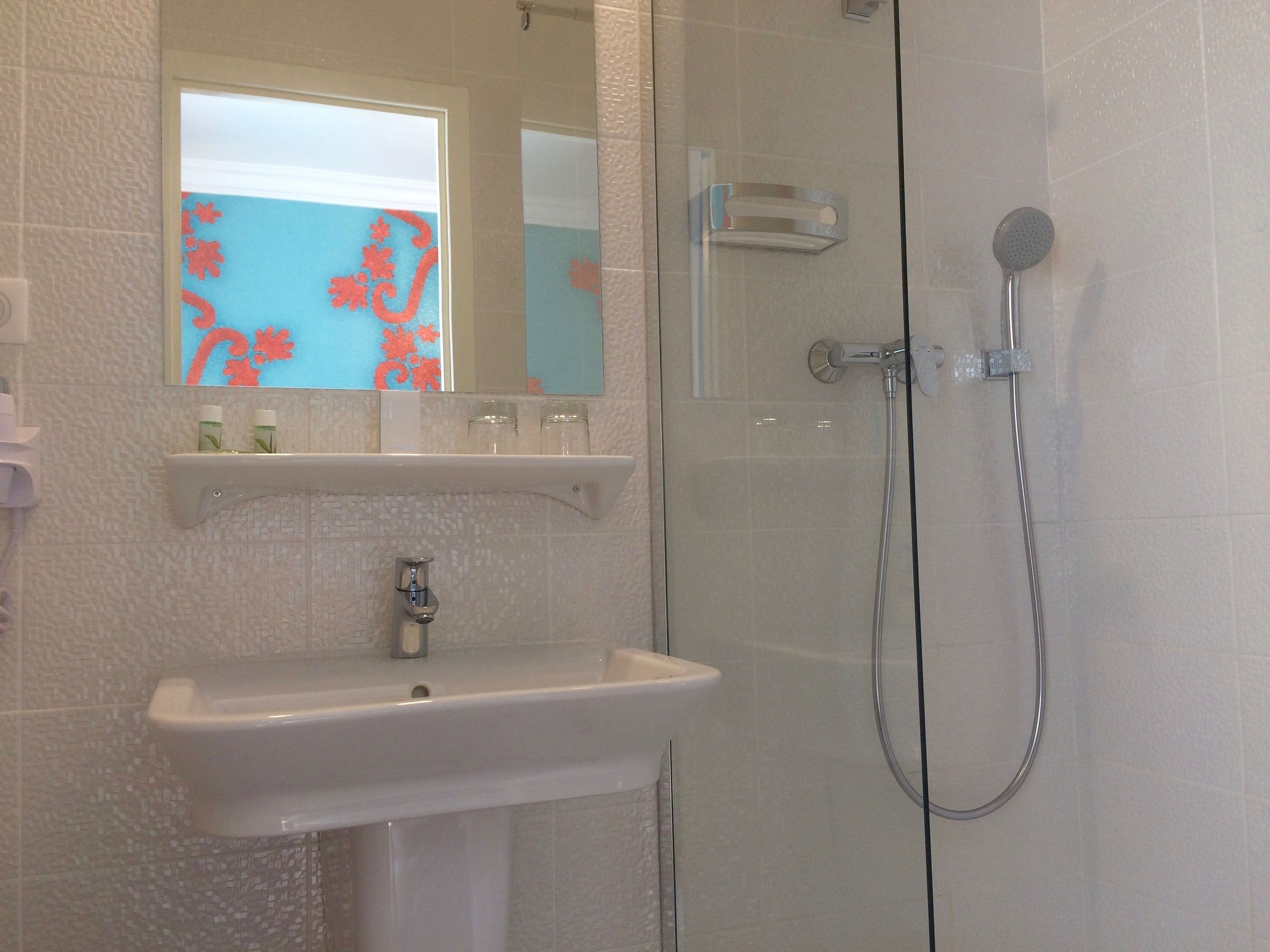superior double room | bathroom | shower, free toiletries, hair dryer, towels
