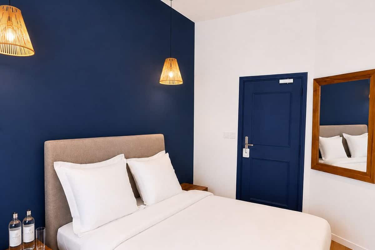 Chambre Confort | Système d’insonorisation, fer et planche à repasser