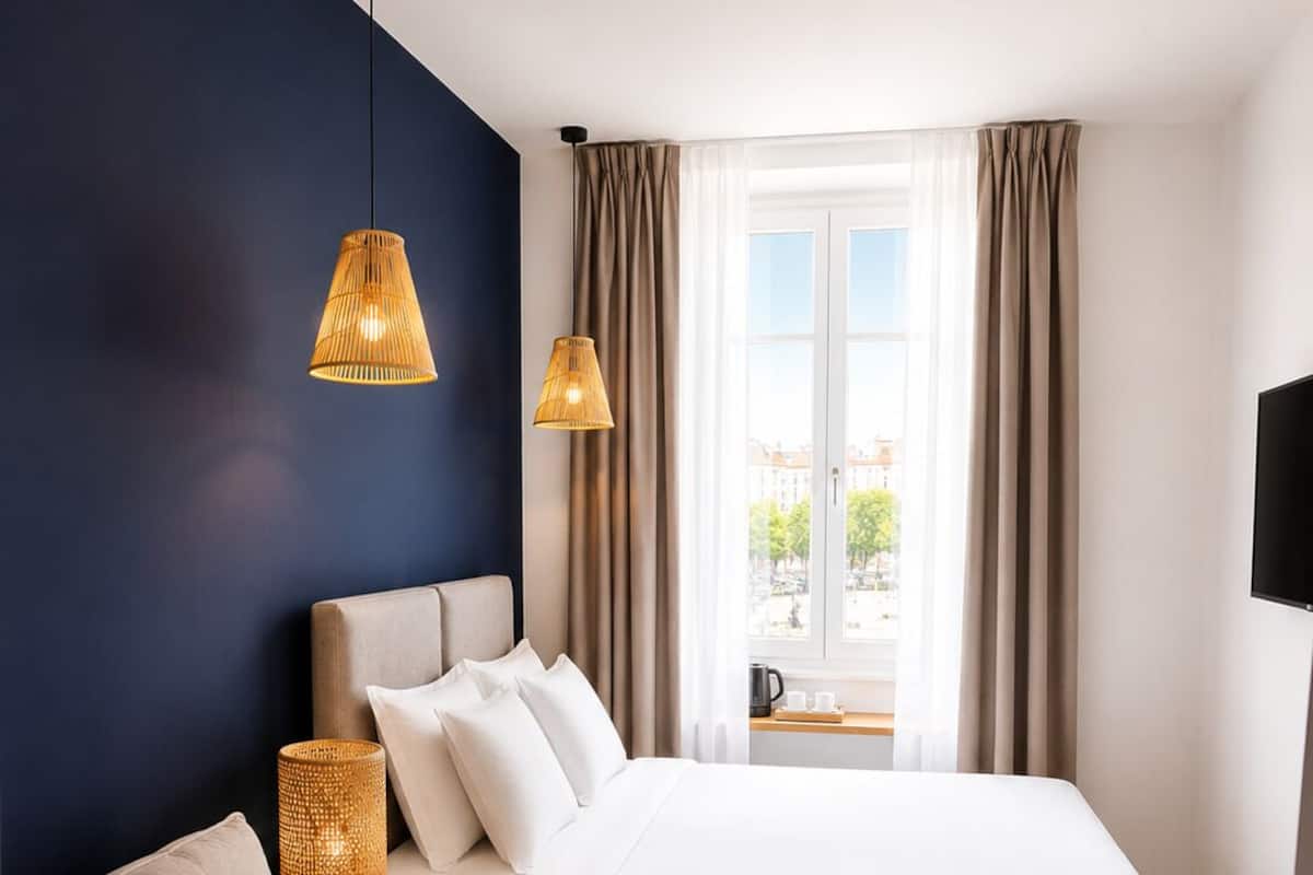 Chambre Deluxe Masséna | Système d’insonorisation, fer et planche à repasser