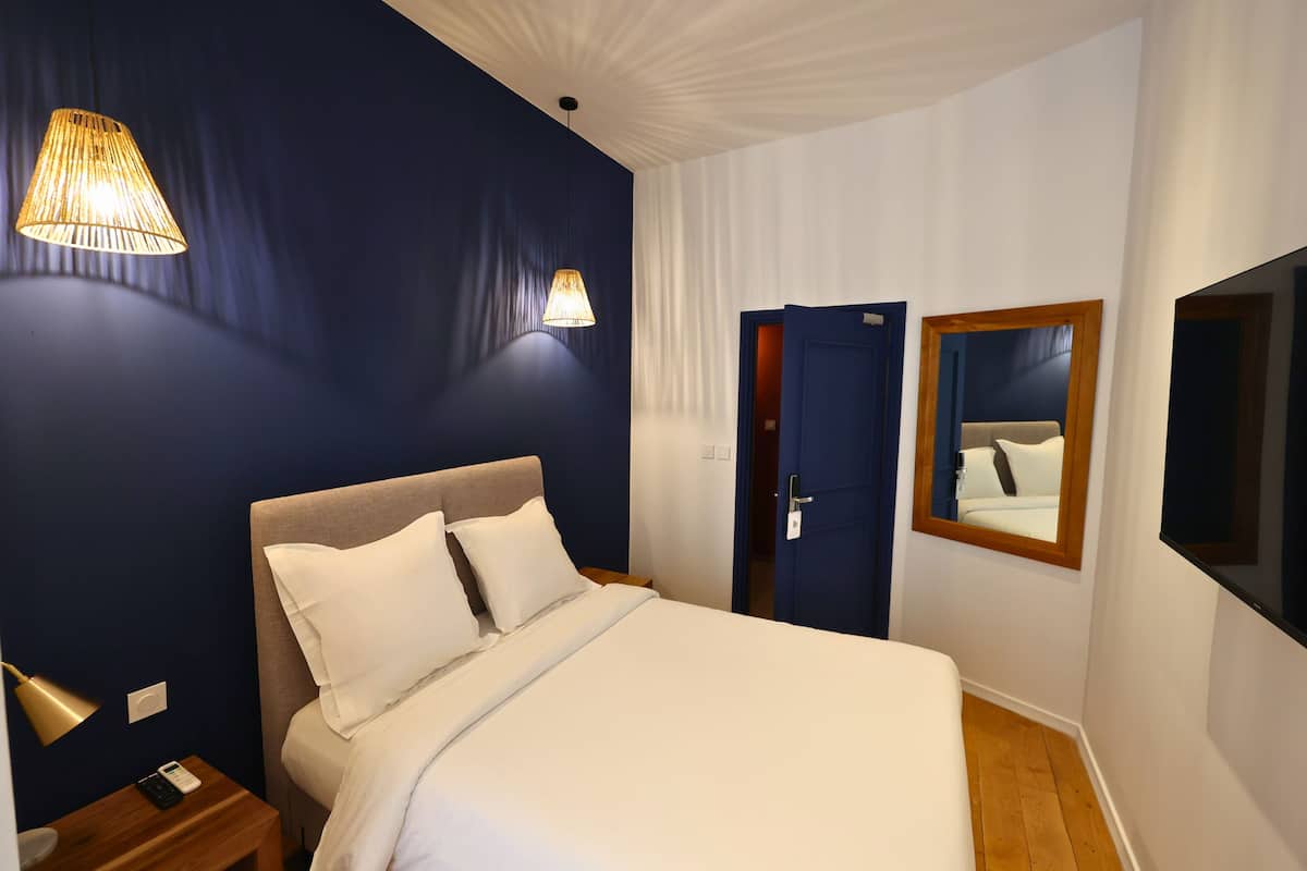 Chambre Confort | Chambres insonorisées, fer et planche à repasser, Wi-Fi gratuit