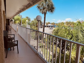 Queen Suite with Two Queen Beds and Beach Canal View - Top Floor | Balcony - Inn on the Gulf (Hudson)