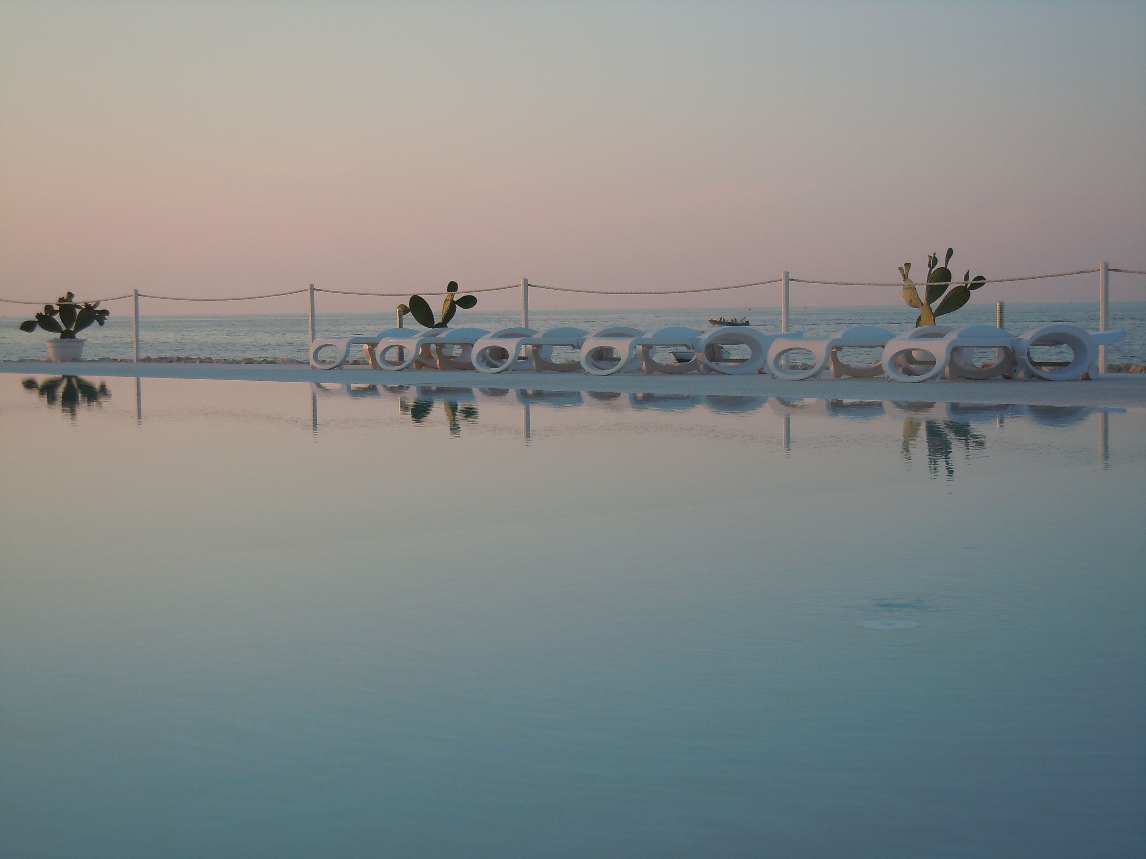 seasonal outdoor pool, pool umbrellas, pool loungers
