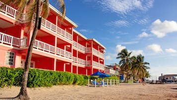On the beach, sun-loungers, beach umbrellas, beach towels