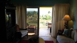Comfort Condo, 2 Bedrooms, Beach View, Beachside | Living room - Mermaid Retreat Regattas #15 by Living Easy Abaco (Marsh Harbour)