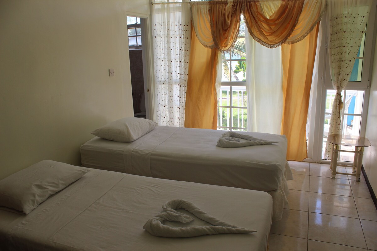 Superior Room, Beach View | Iron/ironing board, free cots/infant beds, rollaway beds, free WiFi