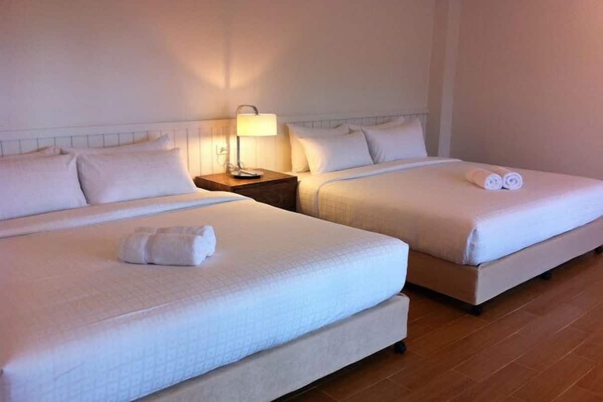 family room | minibar, in-room safe, desk, blackout curtains