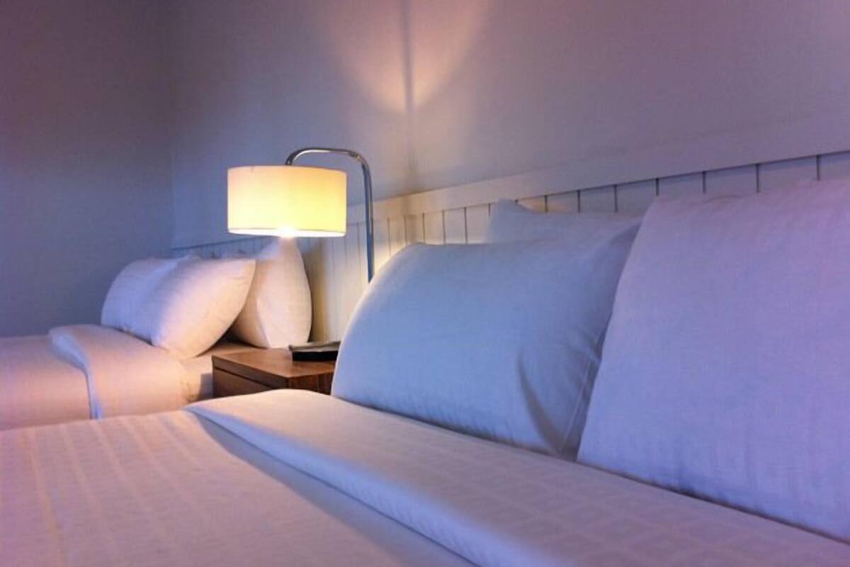 family room | minibar, in-room safe, desk, blackout curtains