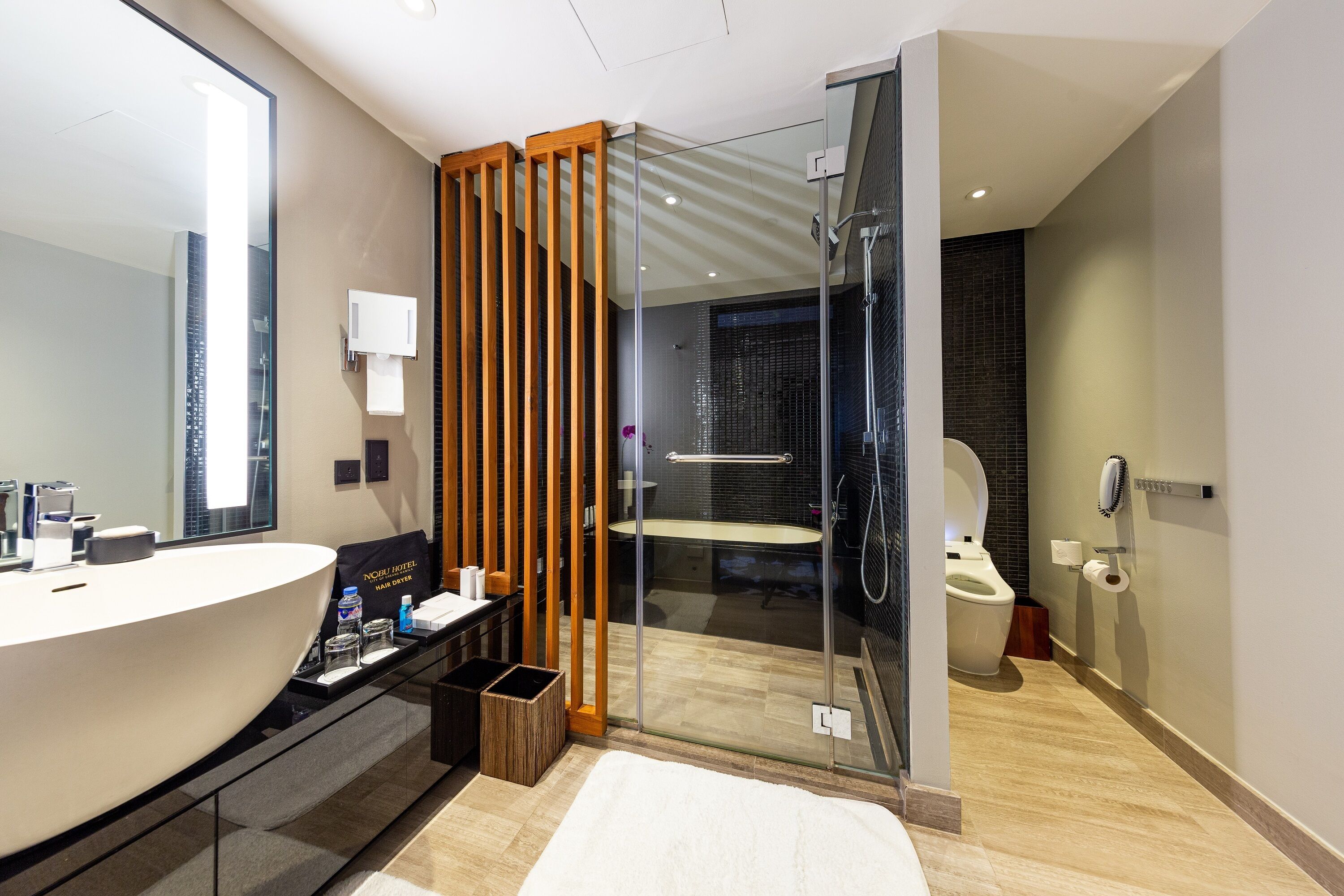 nobu executive room | bathroom | designer toiletries, hair dryer, bathrobes, slippers