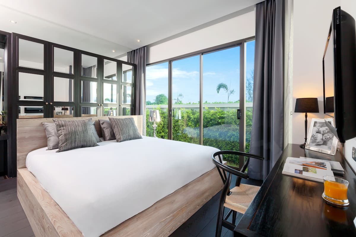 In-room safe, desk, blackout curtains, iron/ironing board