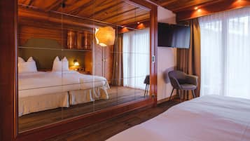 1 Schlafzimmer, hochwertige Bettwaren, Daunenbettdecken, Minibar