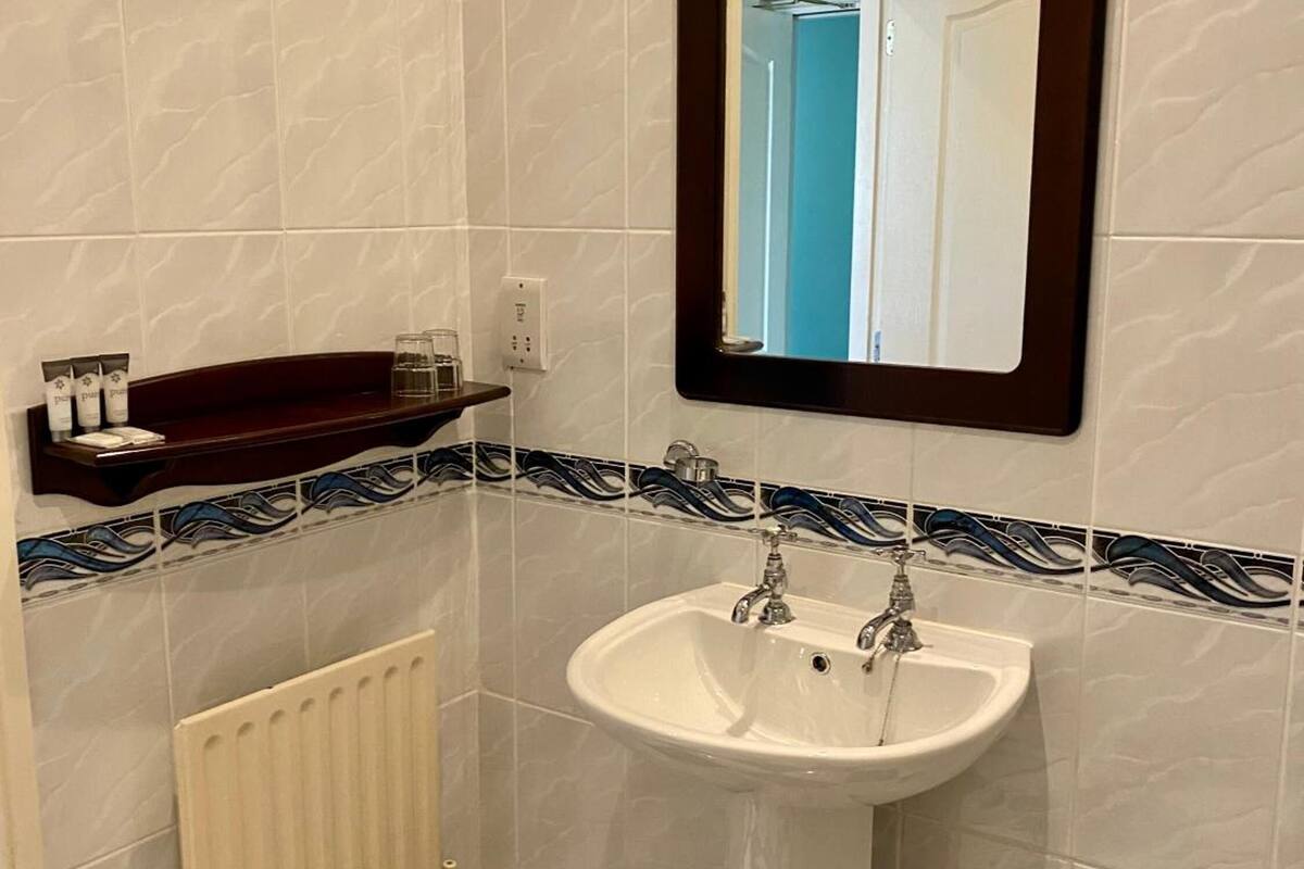 separate bathtub and shower, free toiletries, hair dryer, towels