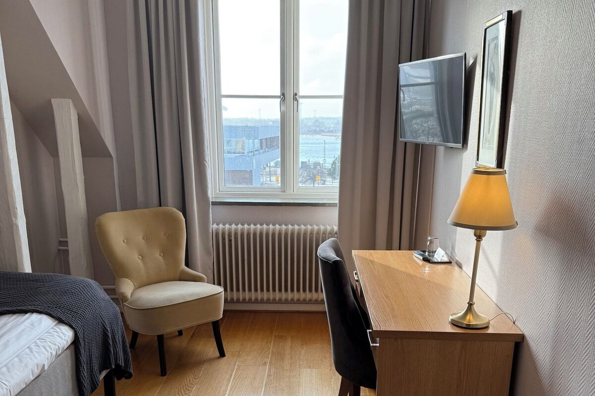 Desk, blackout drapes, iron/ironing board (on request), WiFi (free)